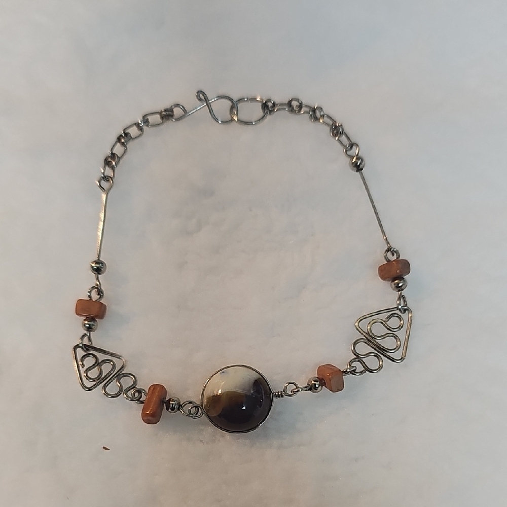 Elegant Silver and Brown Bracelet